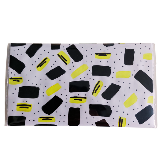Artbag clutch achterzijde zwart gele strepen op wit