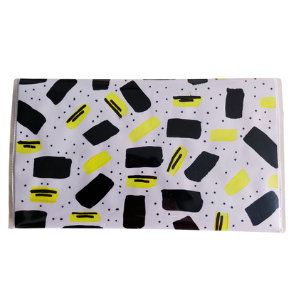 Artbag clutch achterzijde zwart gele strepen op wit