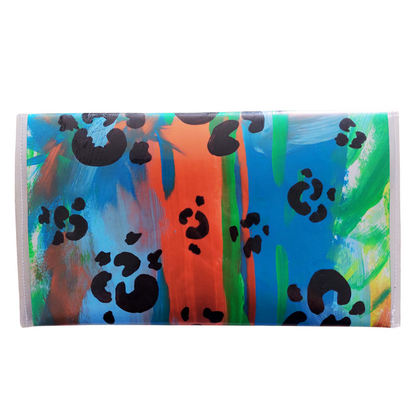 Tasje achterzijde van papier met vinyl in groen, blauw en koperkleuren en zwarte panterprint