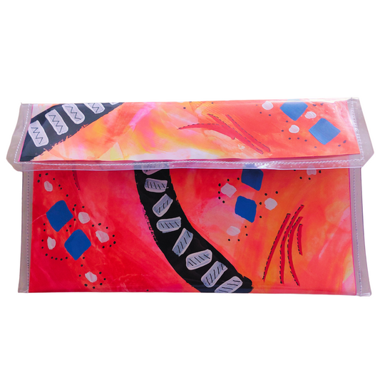 Handtas clutch voorzijde in roze, oranje en geel met abstract zebrapad patroon in zwart wit